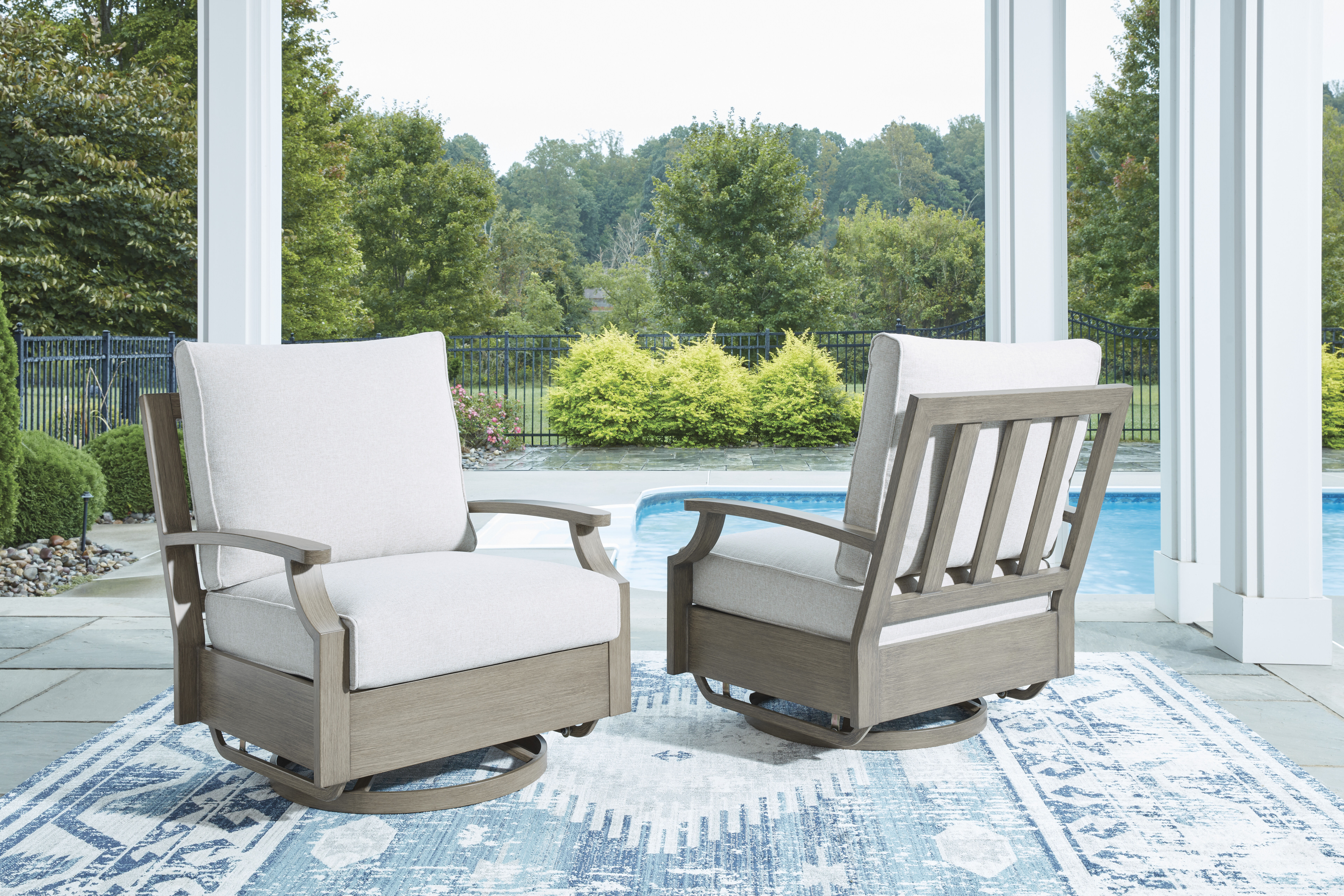 ashley rainier ranch outdoor swivel chairs