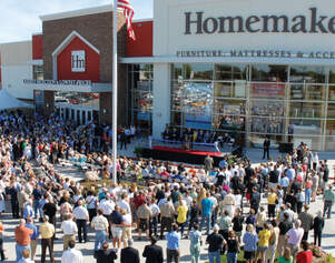 Ribbon cutting event at new Homemakers storefront