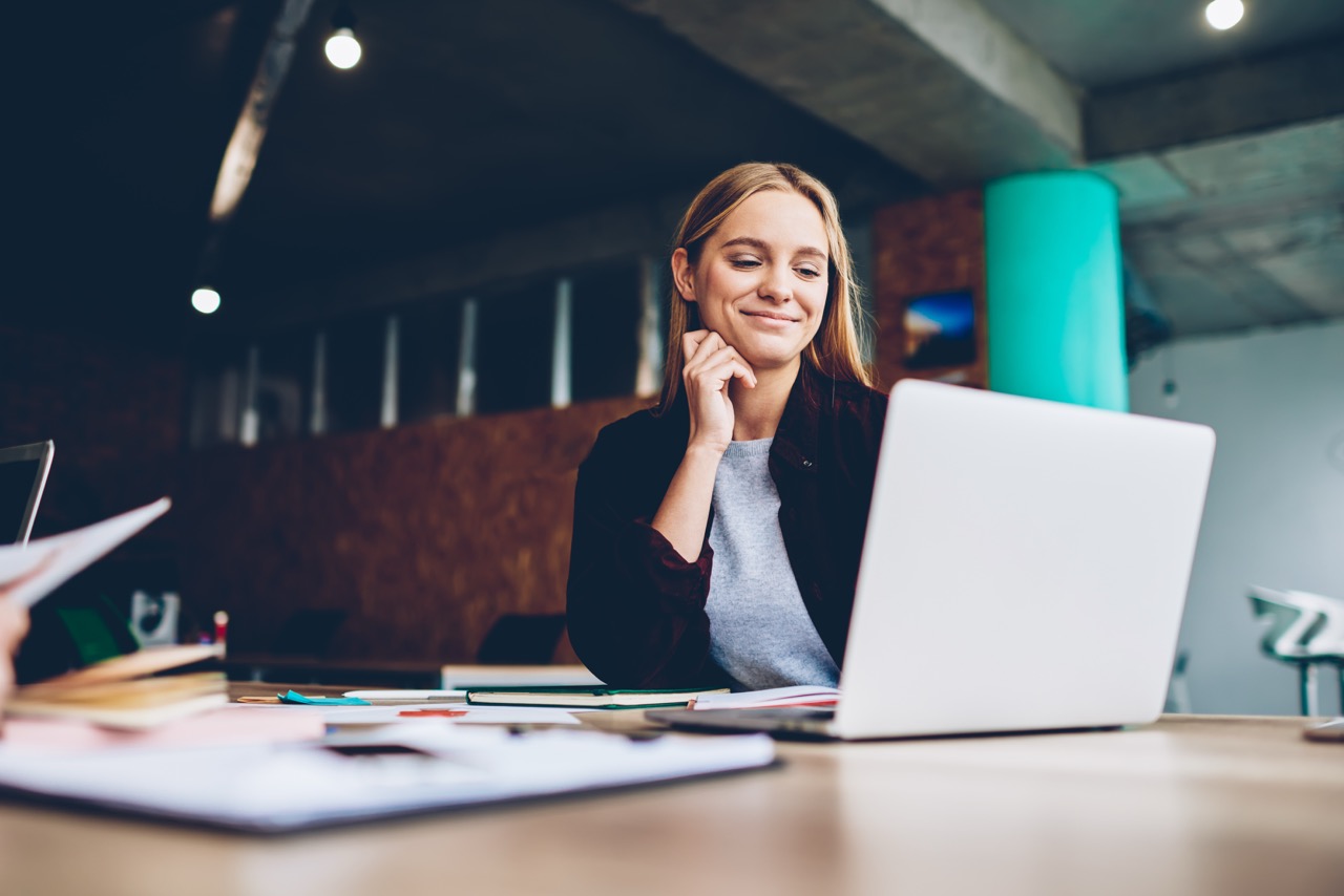 Person sitting at desk filing claim
