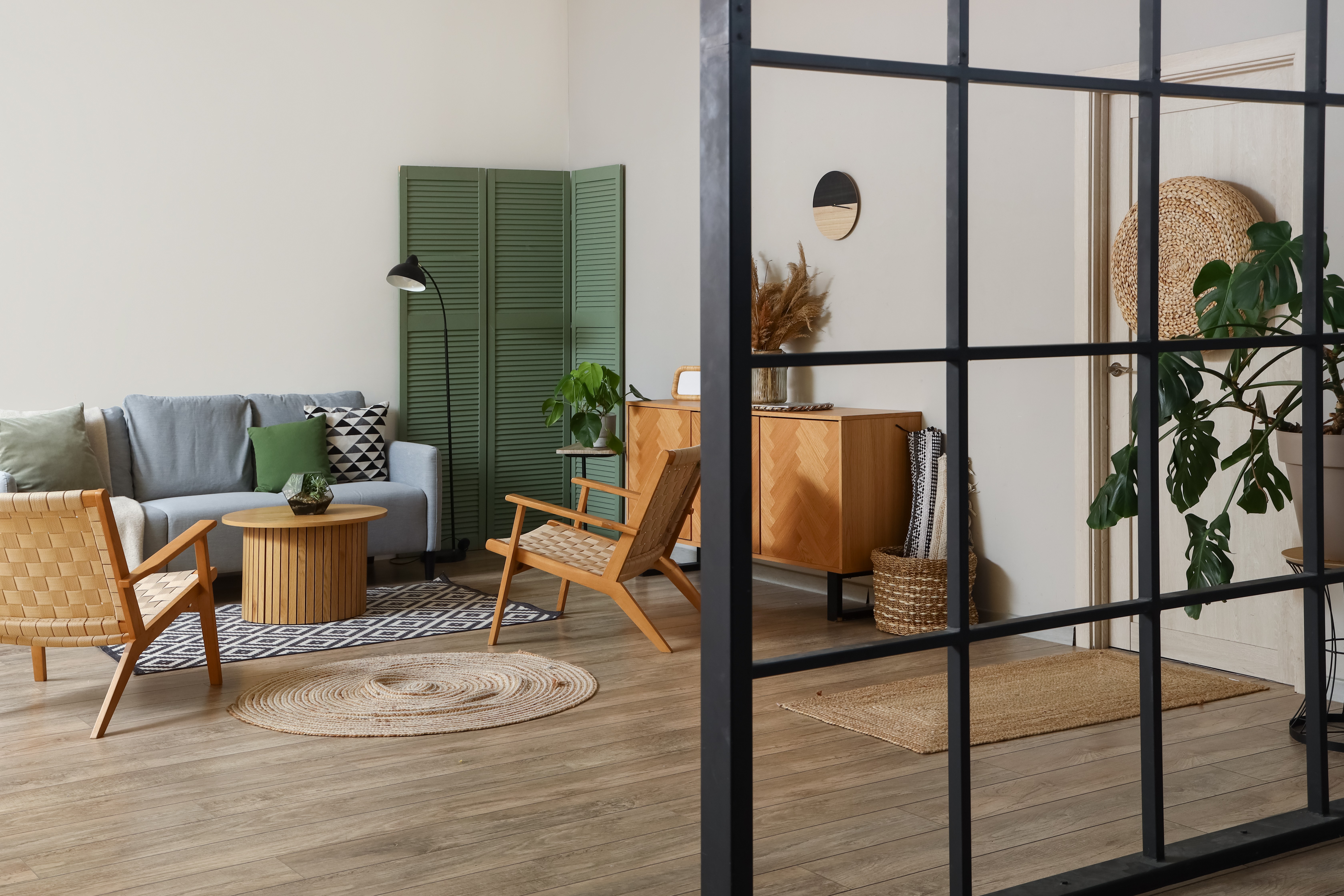 Glass pane divider with black metal framing