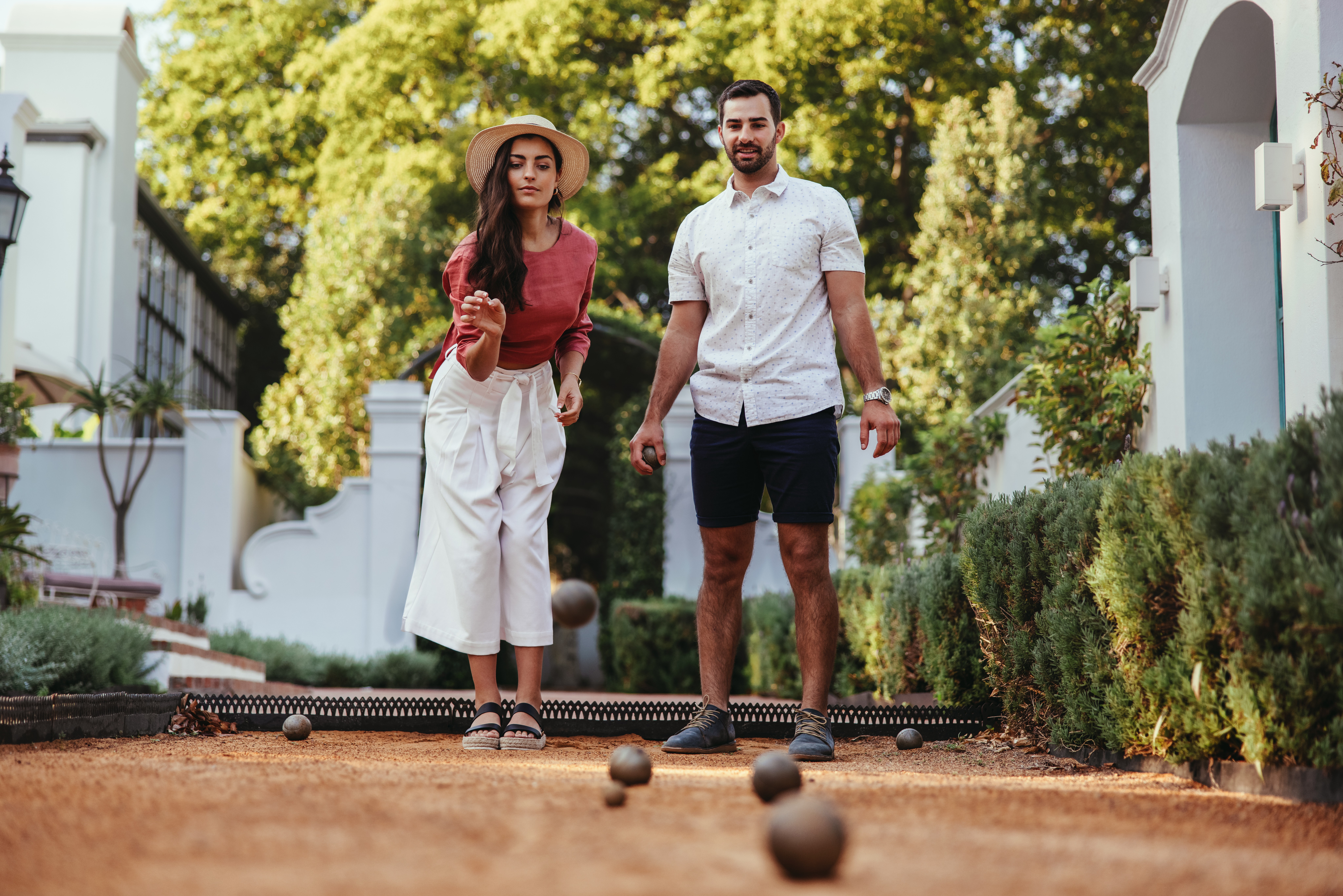 Couple playing bocce ball
