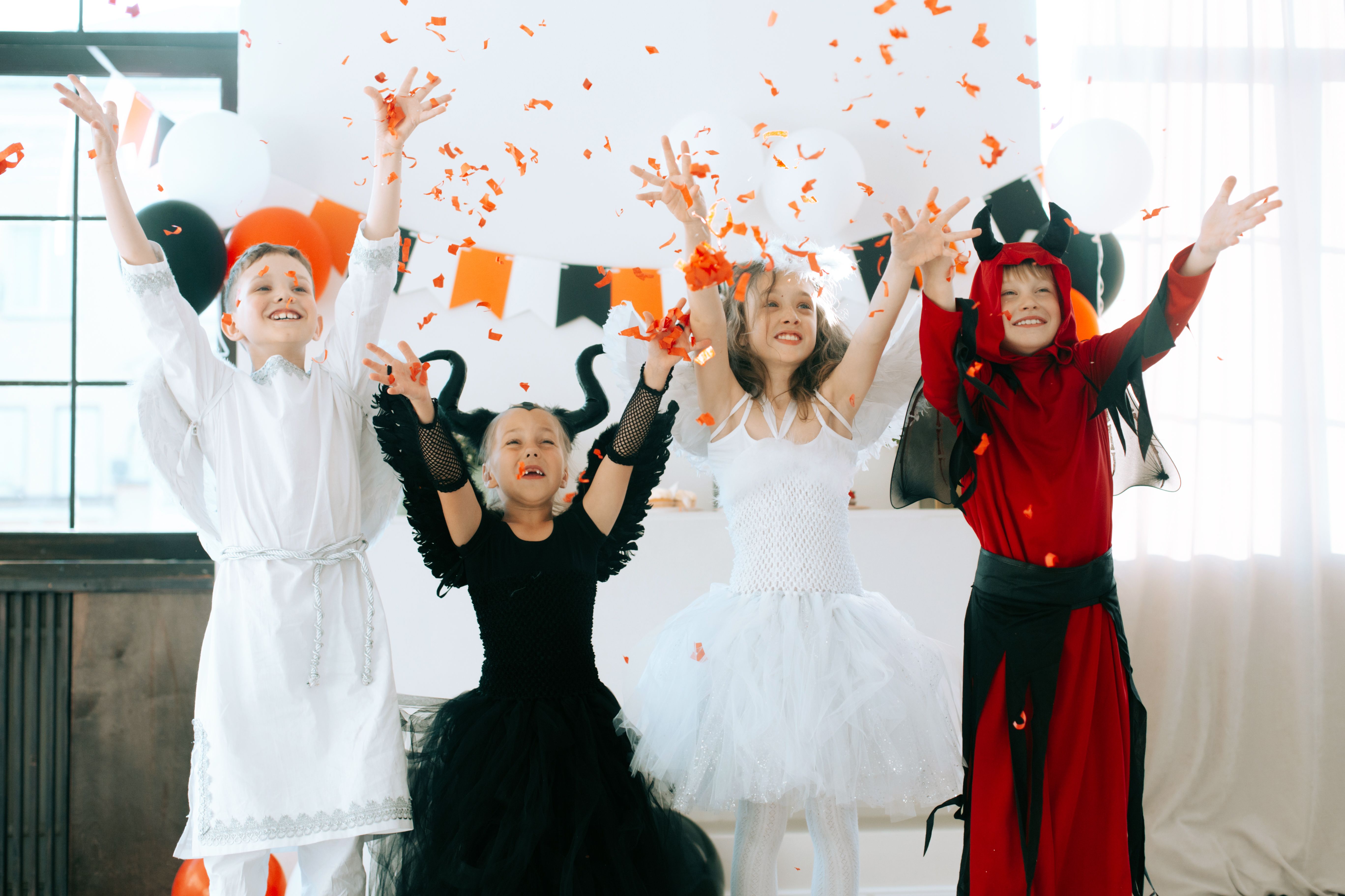 kids in halloween costumes at play
