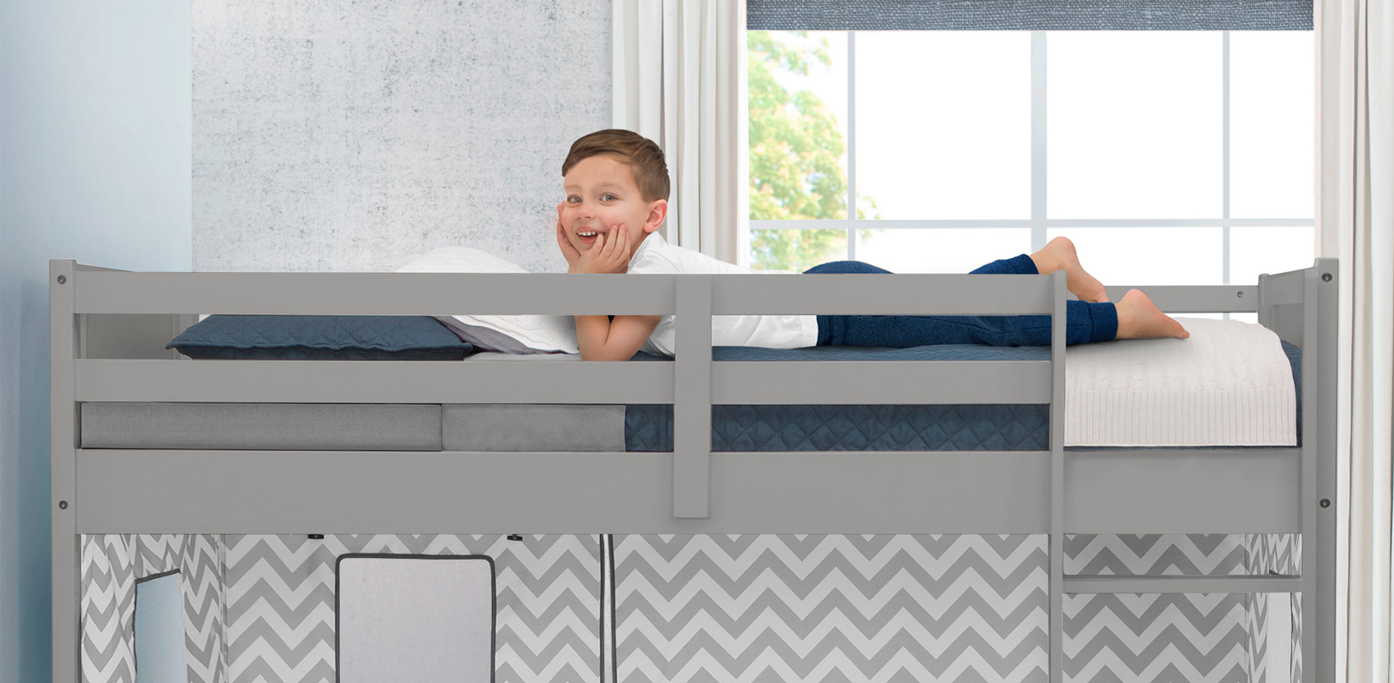 boy on loft bed