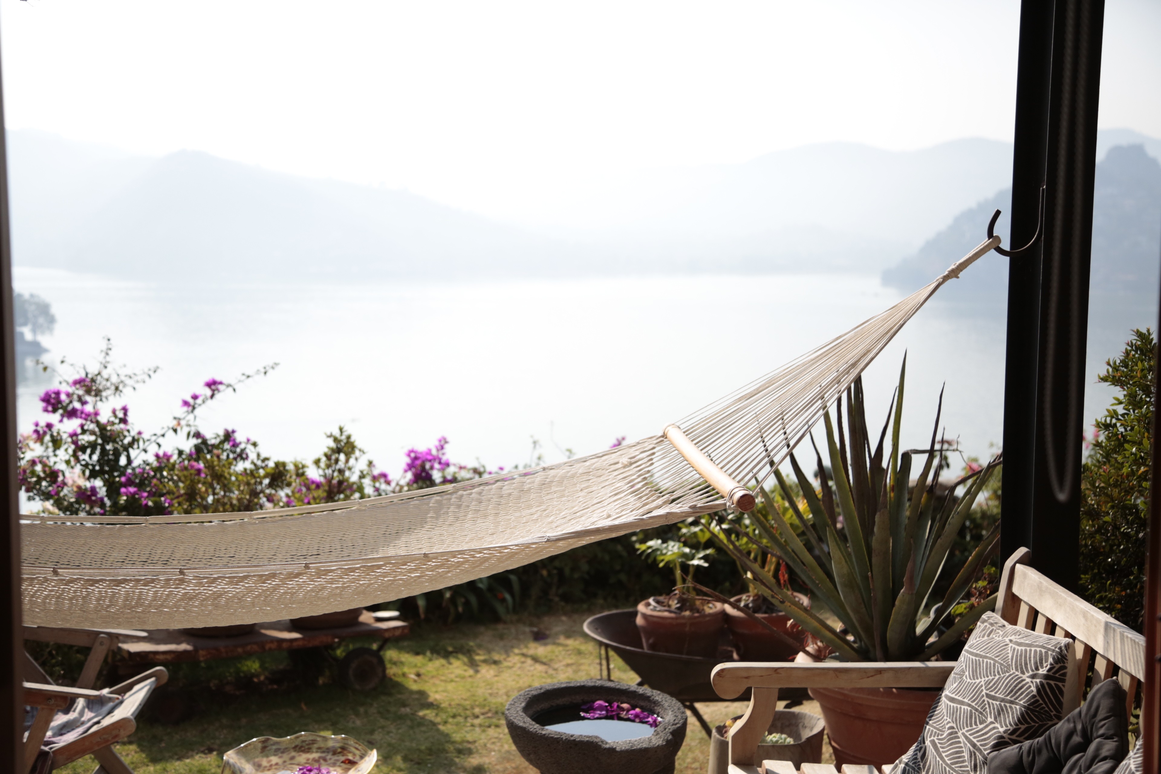 Hammock with spring scene by lake