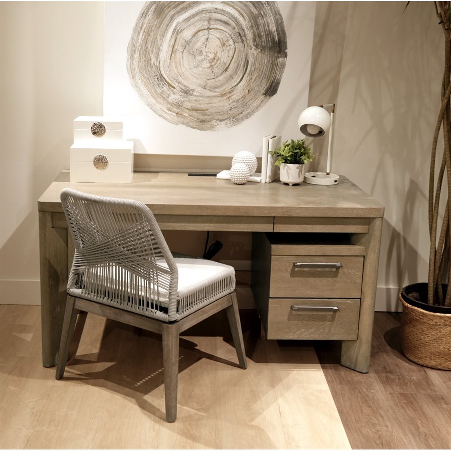 small, lightly toned home office with desk and chair