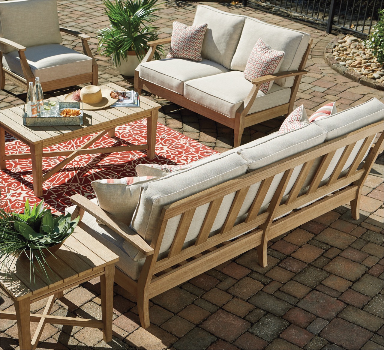 patio sete with red rug