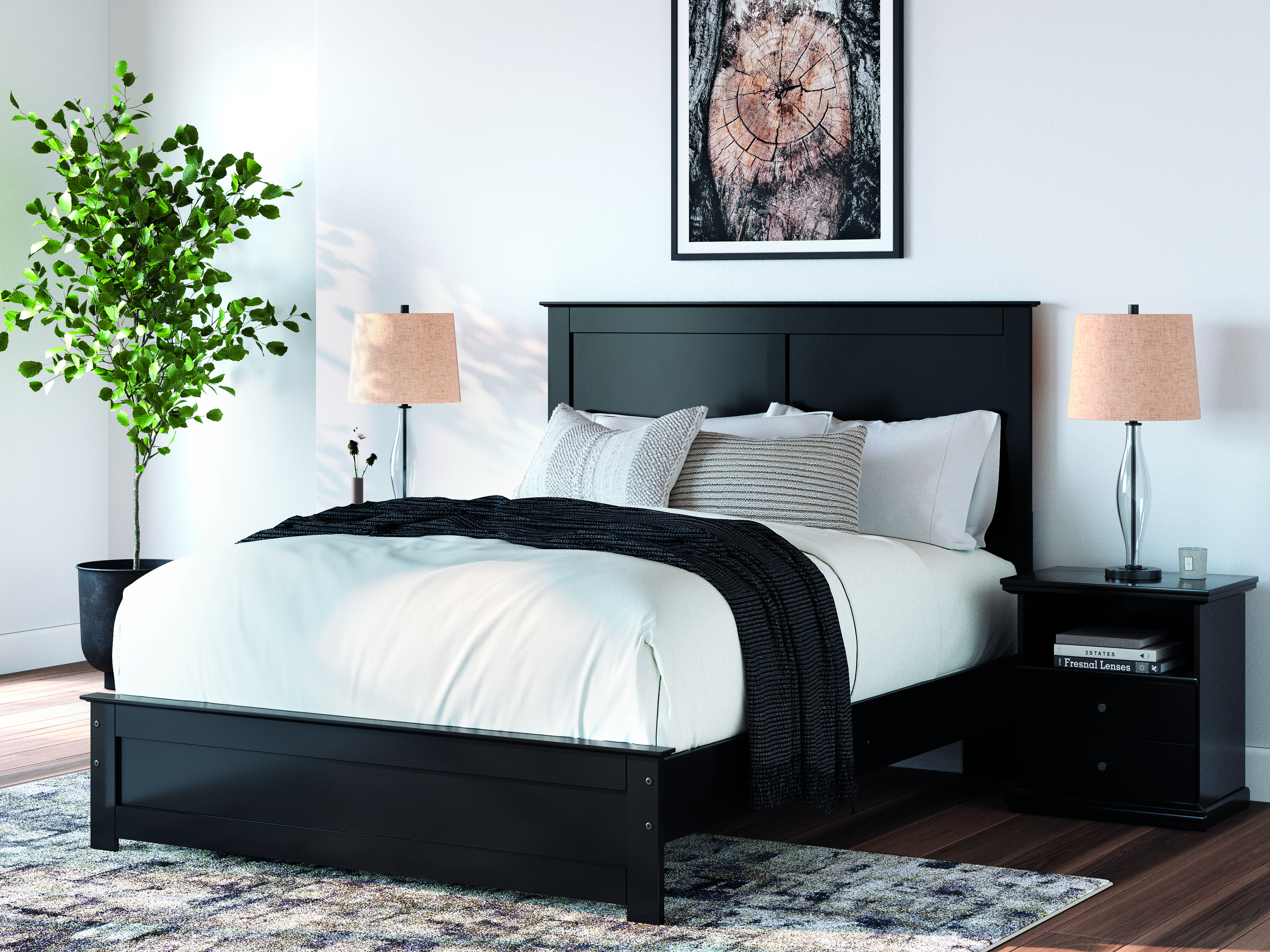 black queen bed with low profile footboard and standard headboard