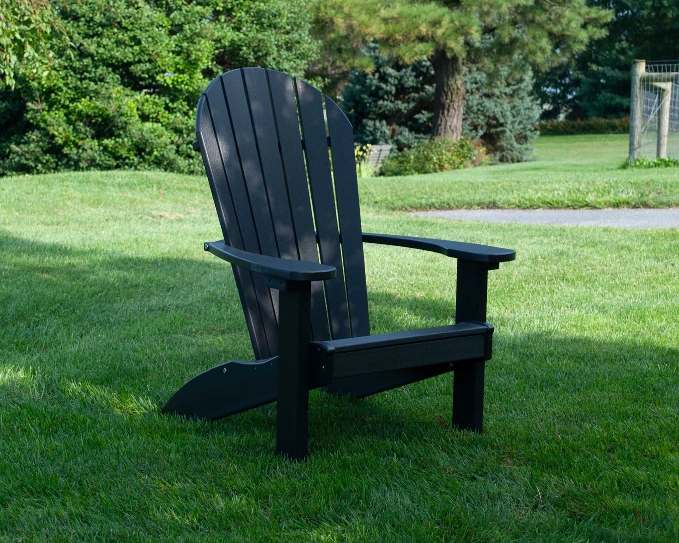 Adirondack chair in the grass
