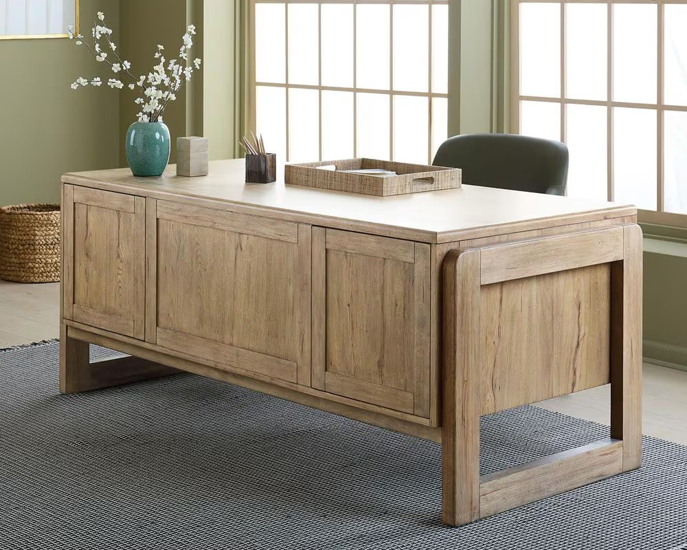 desk with light wood finish with hidden storage behind panels