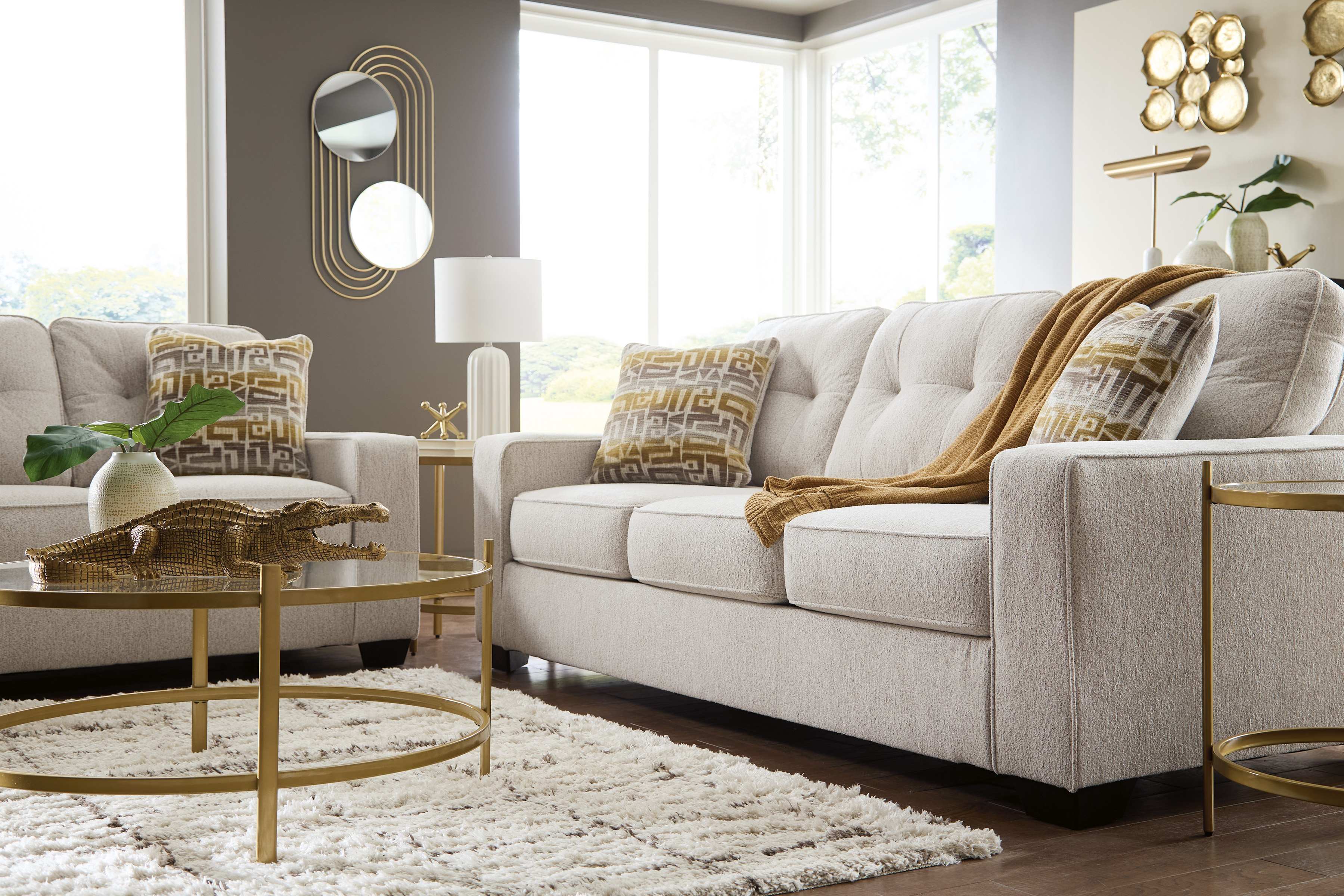 detailed photo of a leather couch with throw pillows