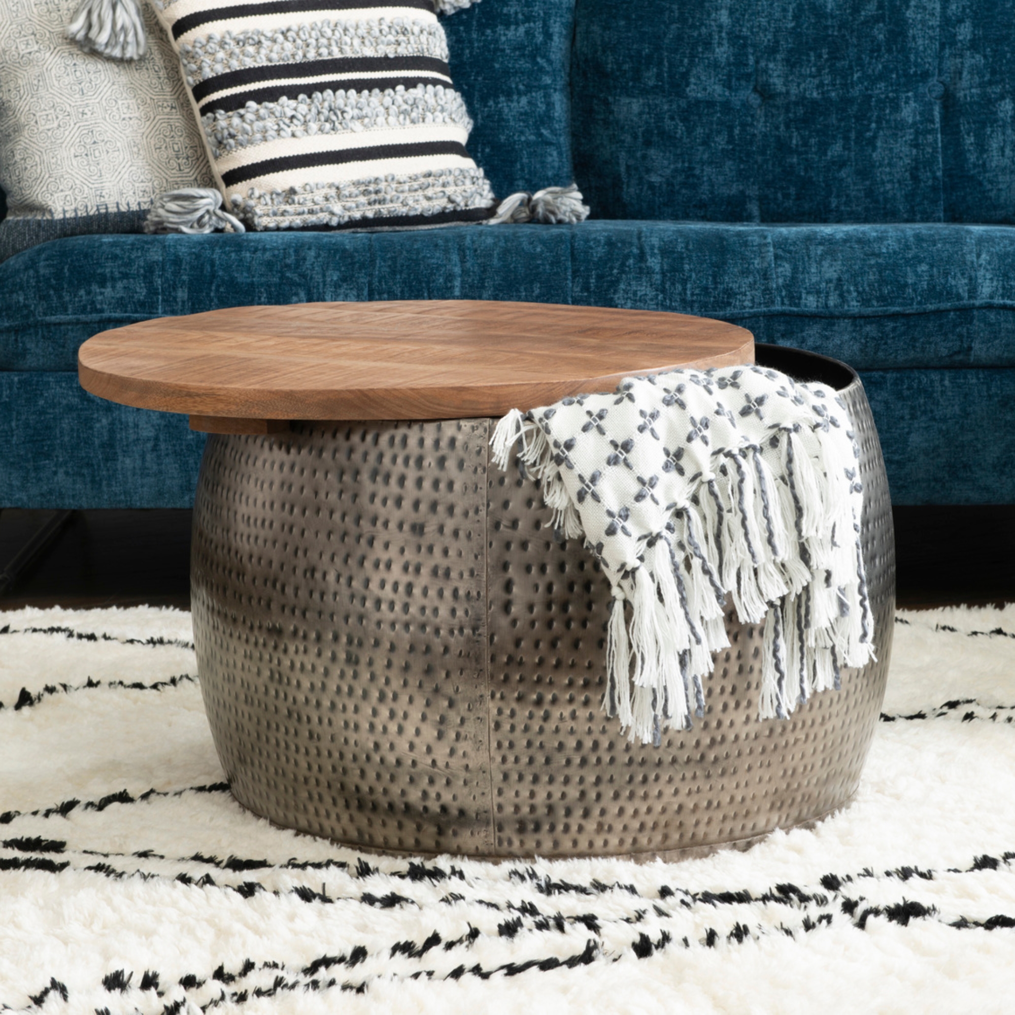 Drum style coffee table with hidden storage under the lid