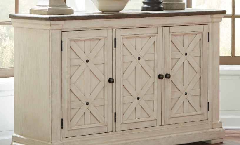 farmhouse style buffet featuring cream wood color, 3 doors, and slight distressing