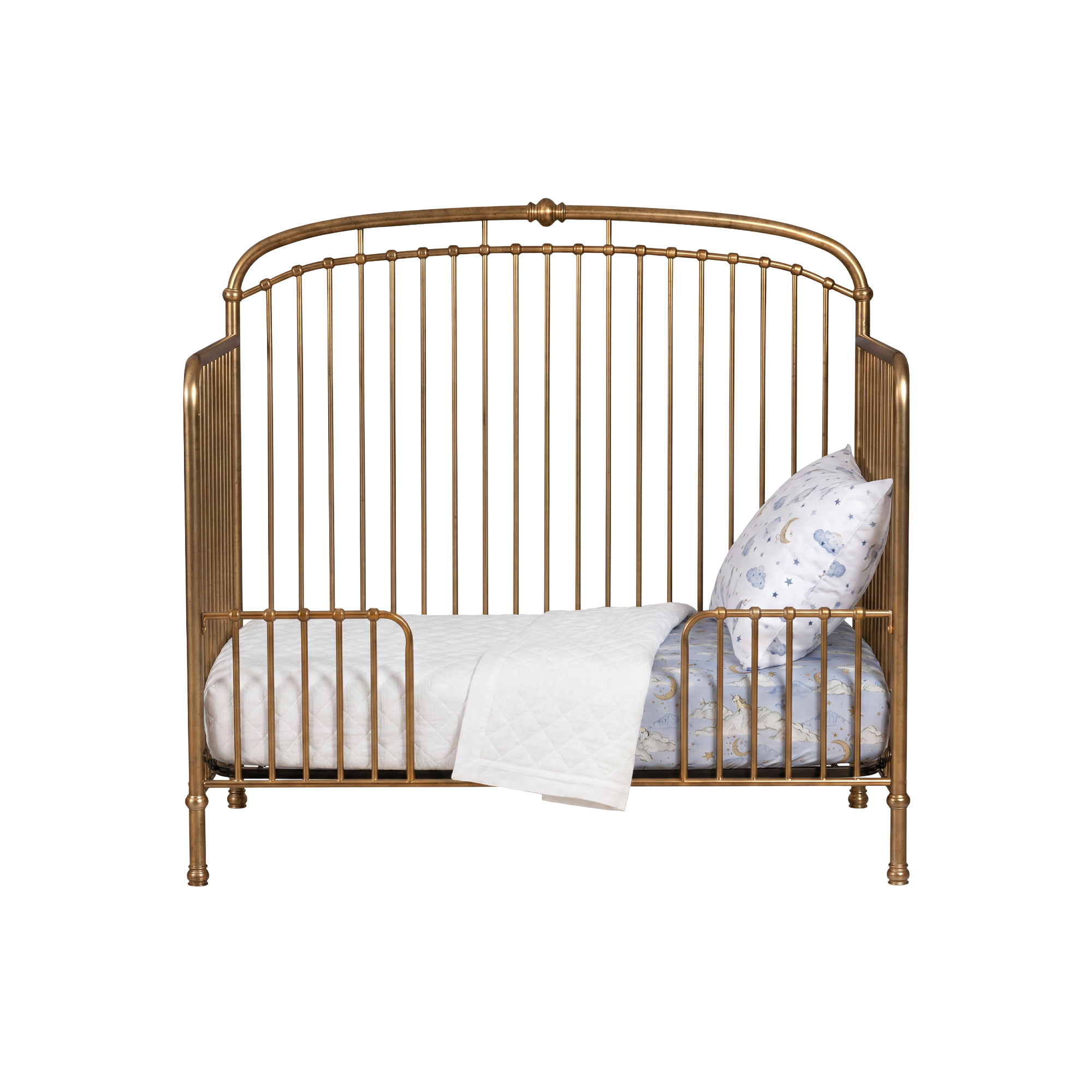Olivia crib with toddler rails on white background and neutral bedding