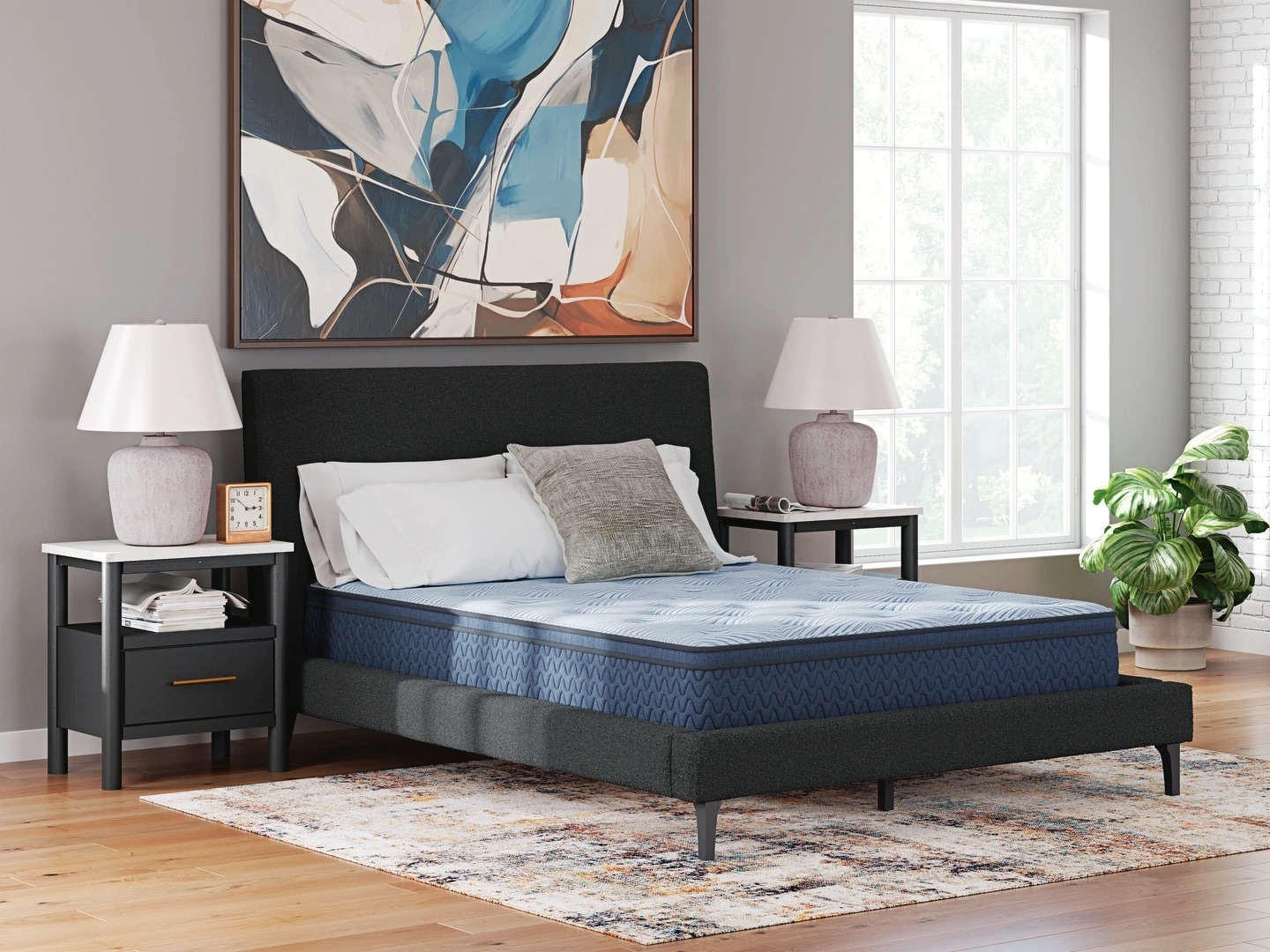 Ashley box mattress in a bedroom