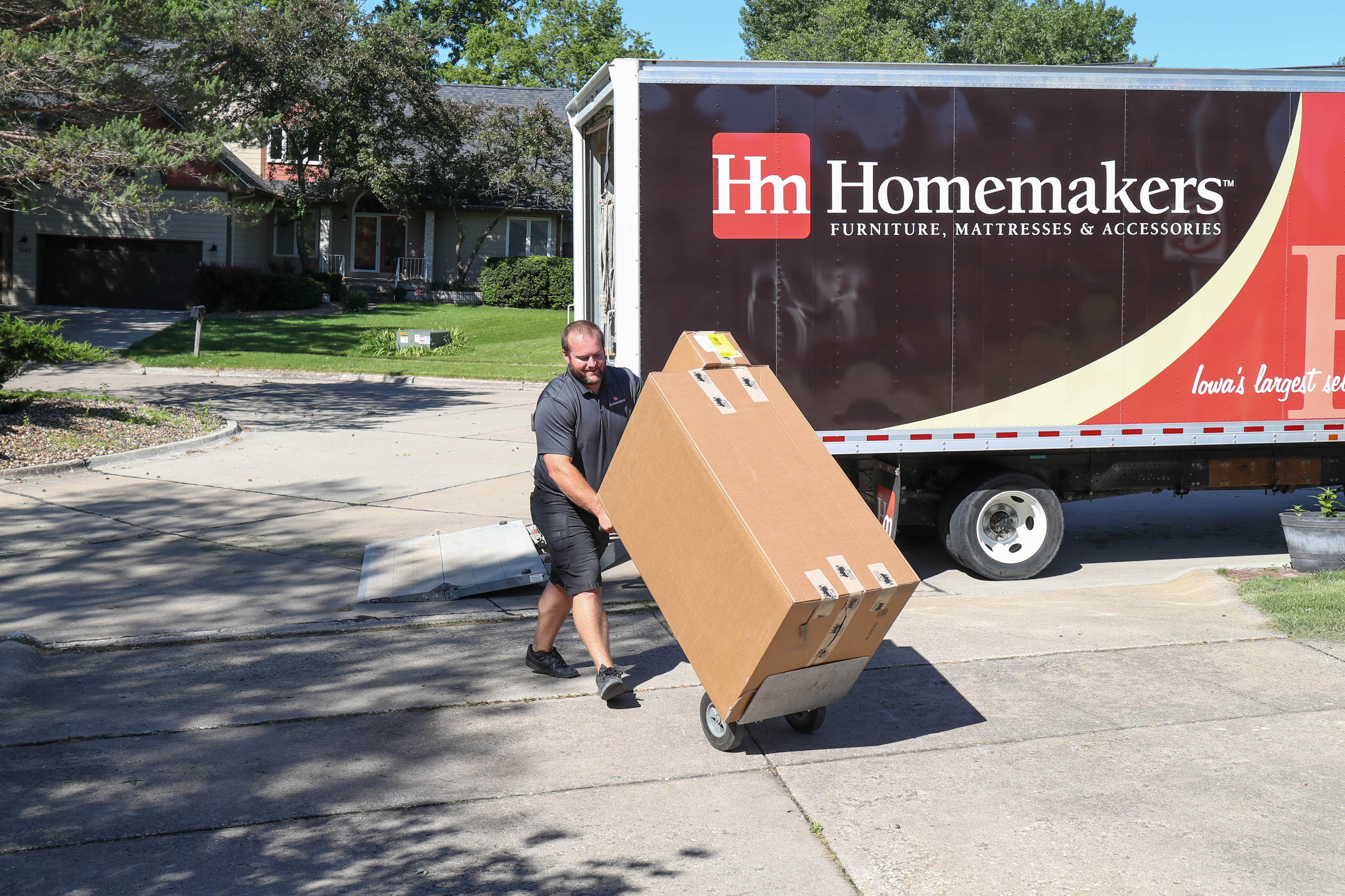 Delivering furniture to a home with Iowa's express shipping