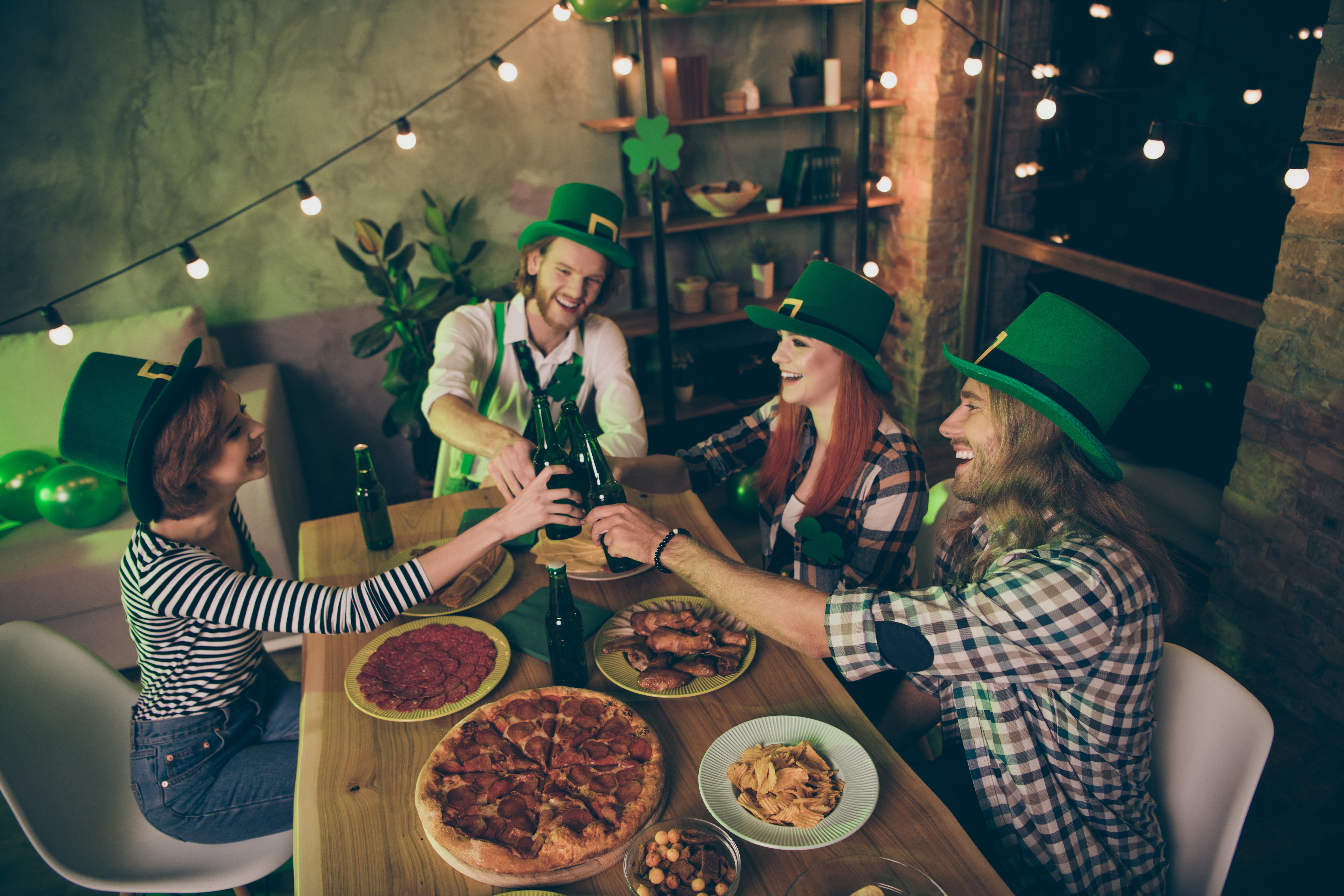 Friends gathered around table for St. Patrick's Day 
