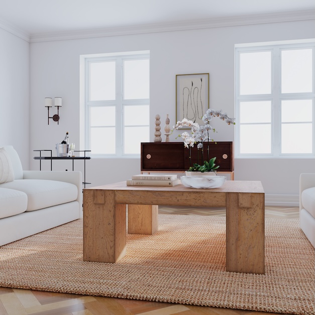 coffee table with a clean, blocky silhouette in a warm toned finish